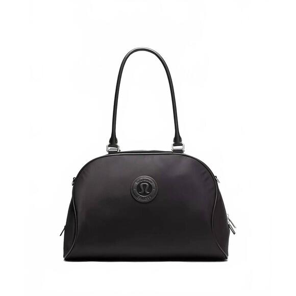 NEW LULULEMON women's bowler duffle bag in blk/slvr